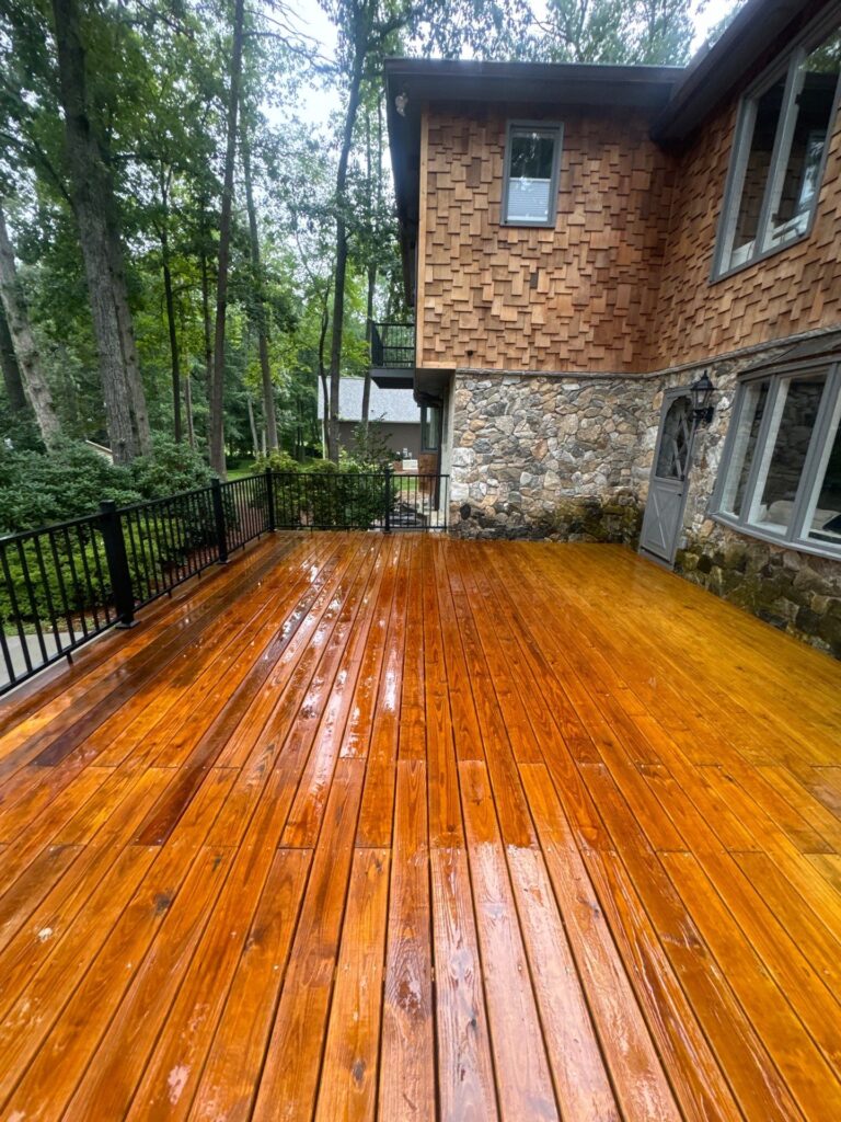 Applying professional wood and concrete sealer in Holly Springs near me