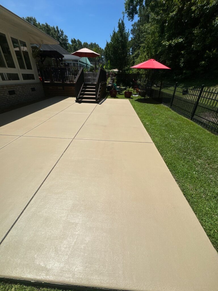 Concrete sealing service team applying protective sealant in Asheville, NC near me.