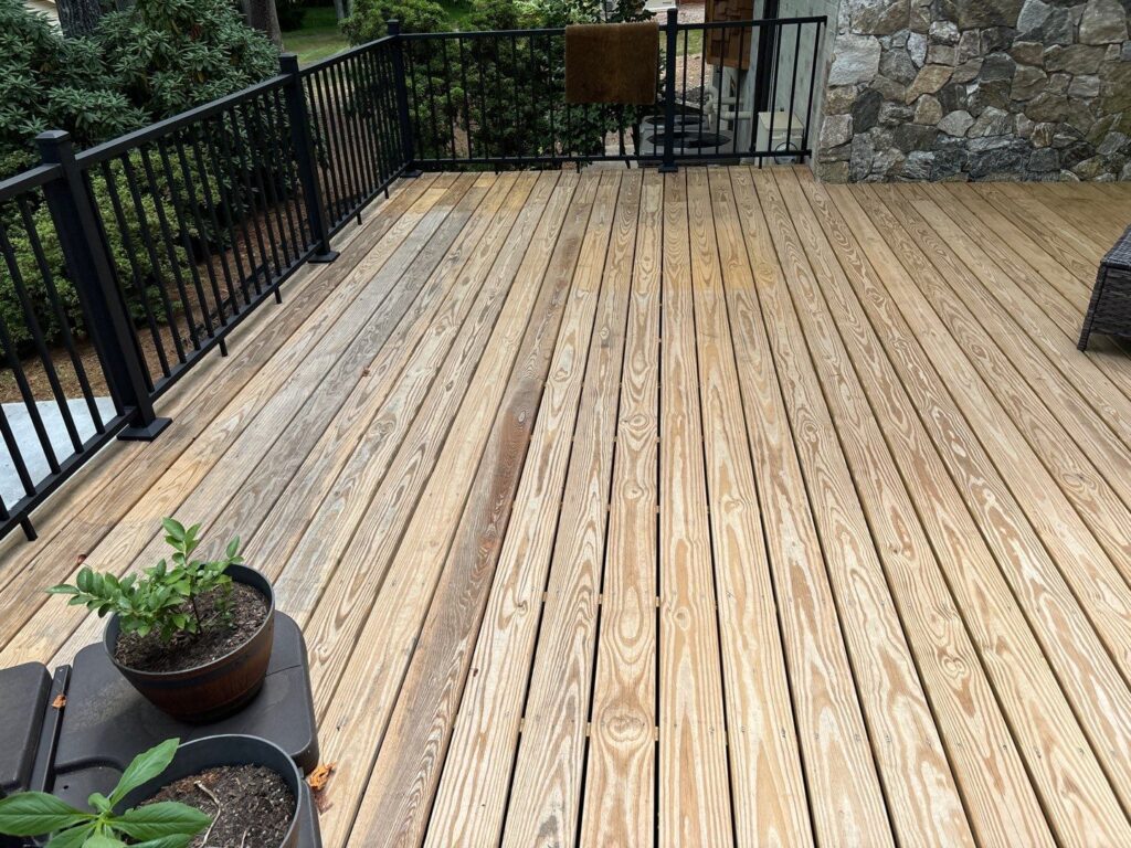 Deck sealing service team from DuraSeal Inc in Apex, NC near me.